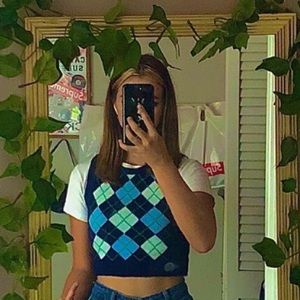 cropped blue sweater vest